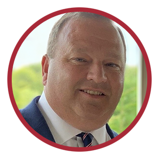 Headshot of the UMC Foundation's Vice President, Jim Roberts, with a red border.