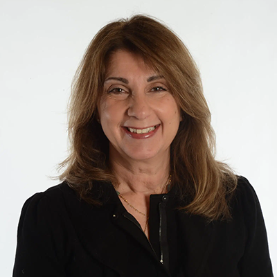 Headshot of UMC's Senior VP of Programs and Services, Cindy Jacques.