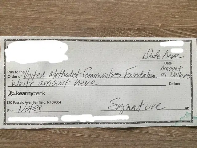 foundationcheck-1.jpg Example of how to properly write out a check when making a donation to the United Methodist Communities Foundation, indicating where to write the organization name, amount, and donor's signature.