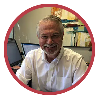 Headshot of UMC Foundation Board Member, Joseph Zigler, with a red border.